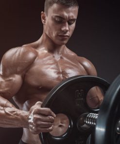 Bodybuilder grabbing weight