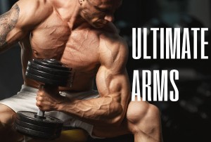 Muscular tanned man lifting weights with biceps